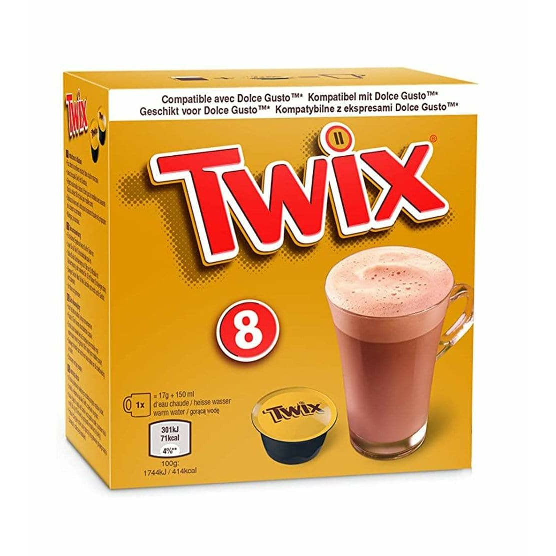 Un carton doré sur fond blanc avec écrit en grand « Twix » en rouge. Sur le devant, il y a une capsule Twix noir et doré et à droite une grande tasse transparente avec du chocolat chaud