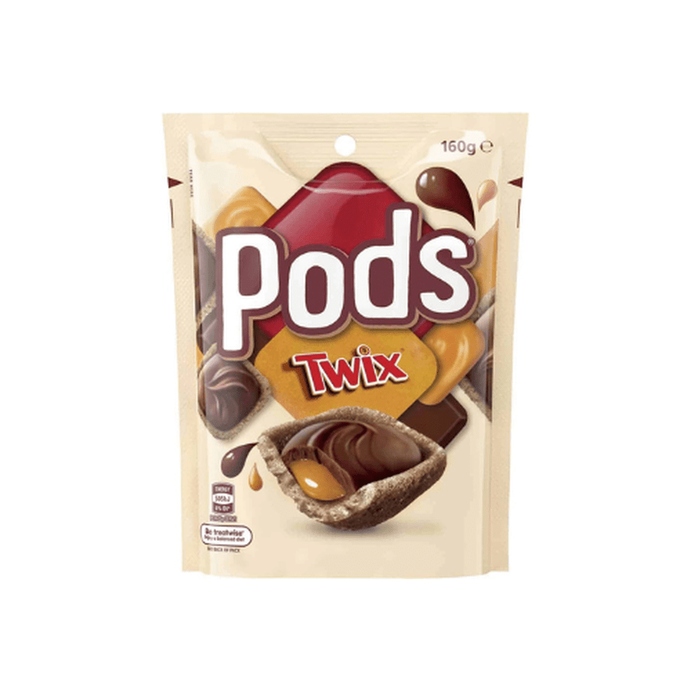 Un emballage beige sur fond blanc avec au centre un biscuit brun, du chocolat au-dessus et entre les 2 du caramel fondant