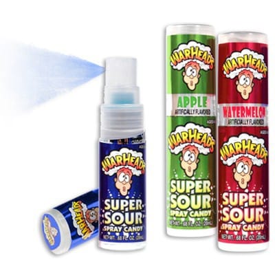 3 tubes sur fond blanc avec sur chacun un visage qui a la tête qui explose, celui de gauche est bleu. Au milieu, il est vert et à droite il est rouge. Il y a un spray bleu qui sort du tube bleu