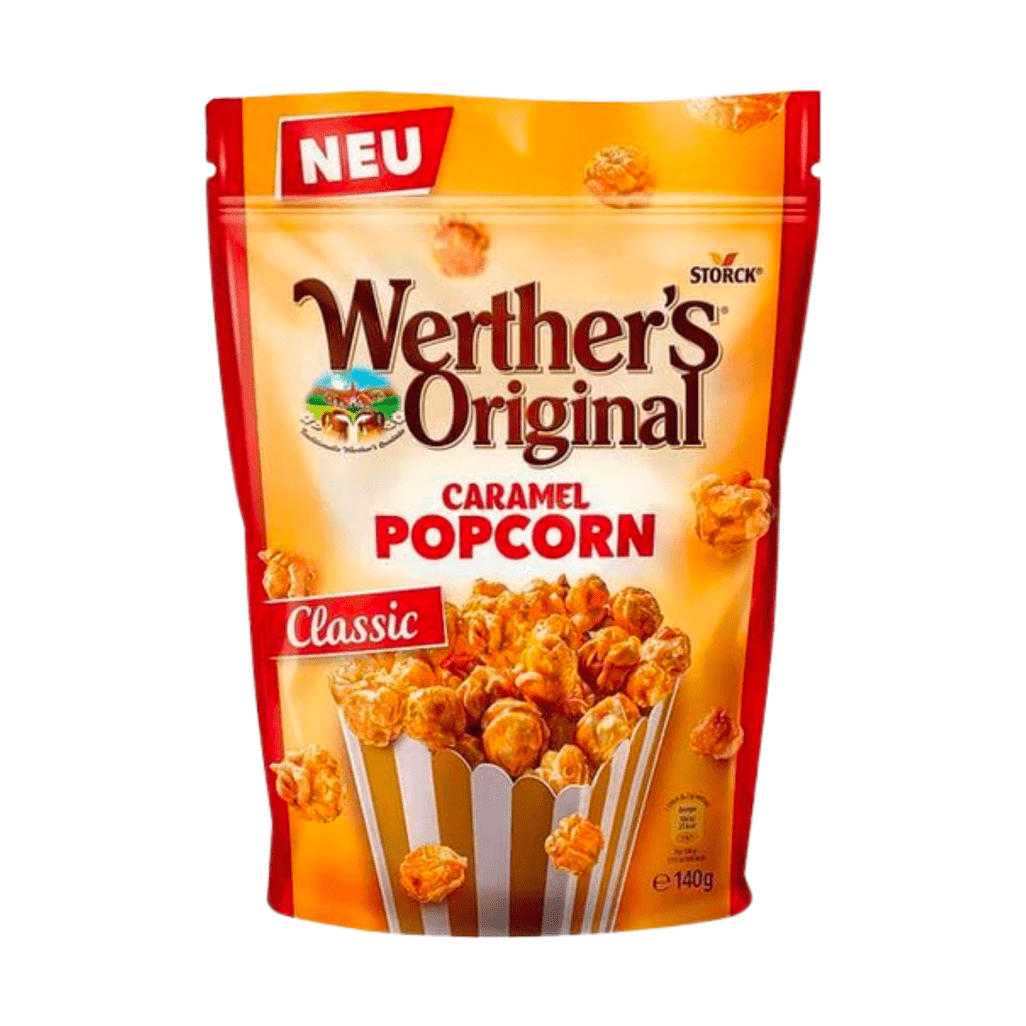 Un emballage de couleur orange et aux extrémités rouge, avec un paquet de popcorn au caramel. Sur le côté gauche, il y une étiquette « Classic » le tout sur fond blanc