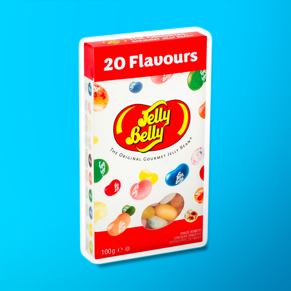 Un paquet blanc sur fond bleu avec plein de bonbons en forme d’haricots de différentes couleurs et au centre un grand haricot rouge avec écrit « Jelly Belly » en jaune