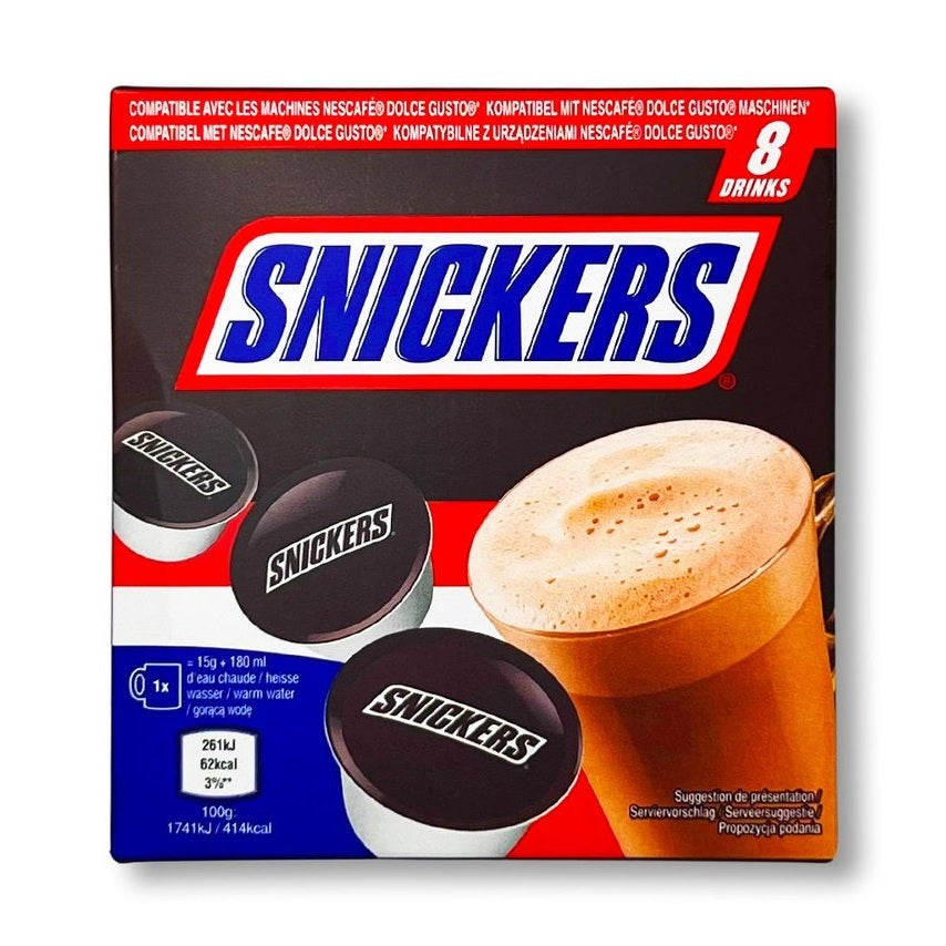 Un carton brun sur fond blanc avec 3 capsules blanches et marrons à droite et une tasse transparente avec du chocolat chaud à gauche