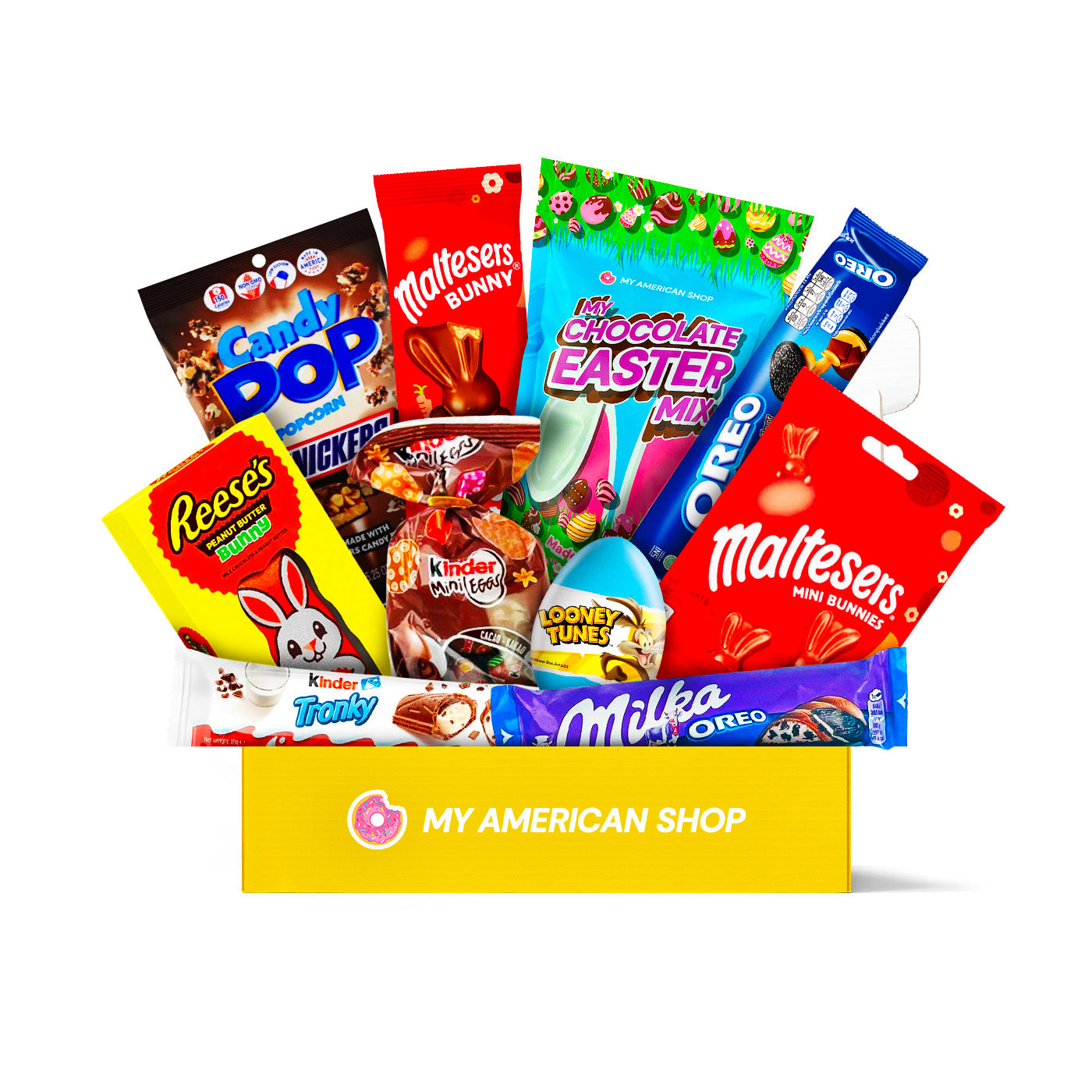 Un carton rectangulaire jaune sur fond blanc avec des produits tels que Kinder, Looney Tunes, Reese’s, Candy Pop, Maltesers. Le tout sur fond blanc