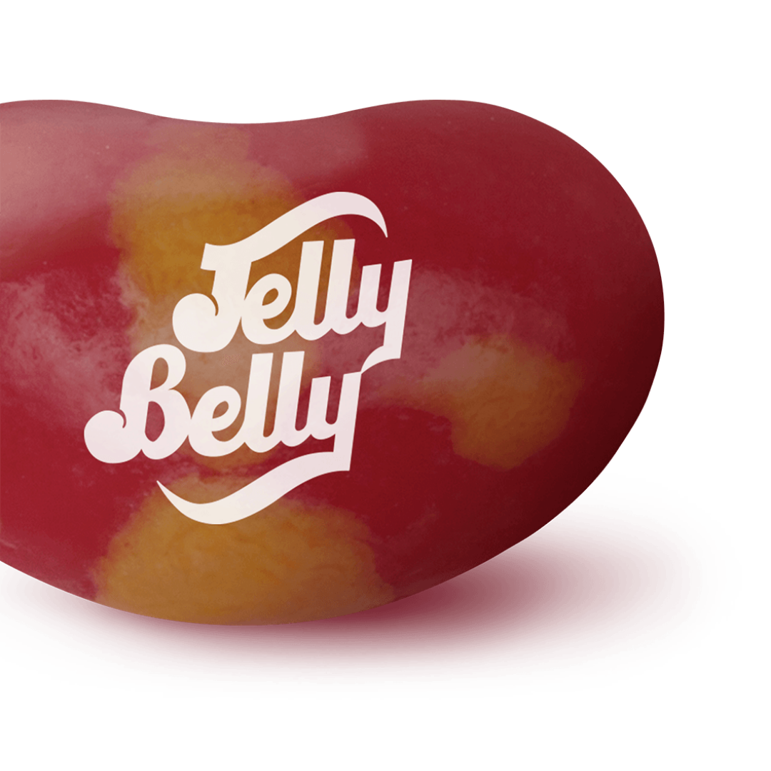 La partie droite d'un Jelly Belly rouge sur fond blanc